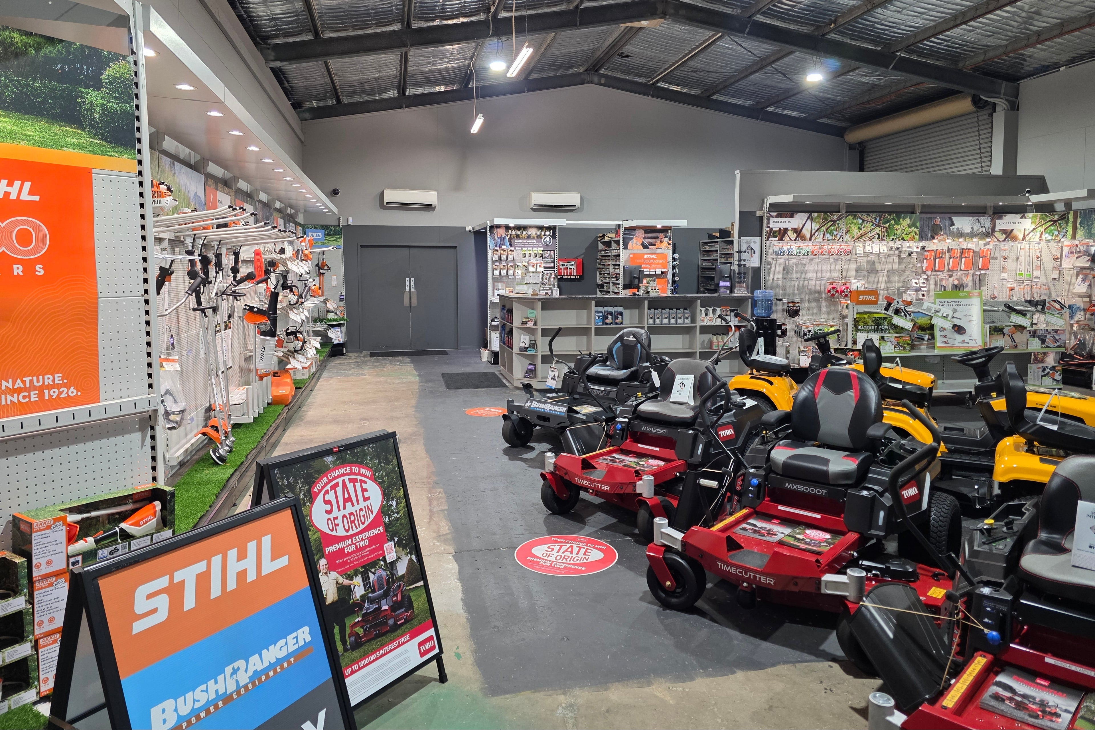 Ipswich Mower & Saw Service Store interior with lawn mowers and Stihl branding